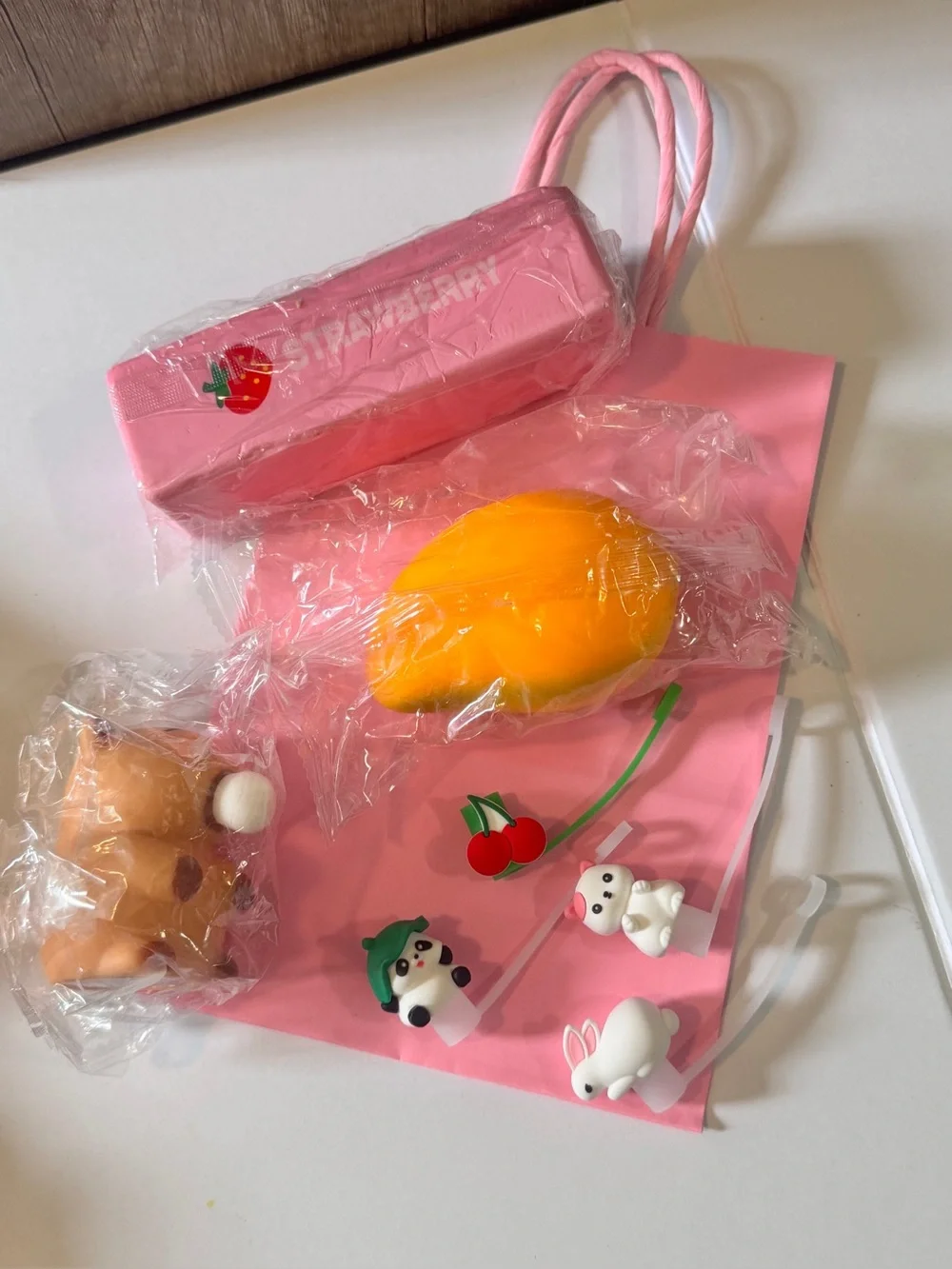 Kids Pink Gift Bag with Yellow Mango Toy and Cute Animal Squishies